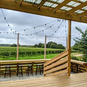 Corey Creek Tap Room - a view of a vineyard - Wine Tasting Room Near Me - Southold, New York Corey Creek Tap Room - a view of a vineyard - Wine Tasting Room Near Me - Southold, New York