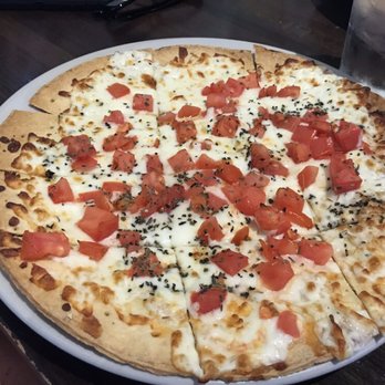 Patrick McGovern's Pub & Restaurant - Tomato Basil Flatbread - Pubs Near Me - Saint Paul, Minnesota Patrick McGovern's Pub & Restaurant - Tomato Basil Flatbread - Pubs Near Me - Saint Paul, Minnesota