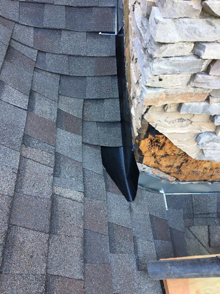 Slide of Rocco’s Roofing