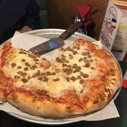 Small sausage pies all cheese pizza