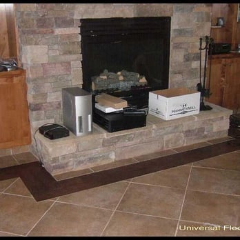 Universal Flooring - a fireplace in a living room - Flooring Near Me - Citrus Heights, California Universal Flooring - a fireplace in a living room - Flooring Near Me - Citrus Heights, California