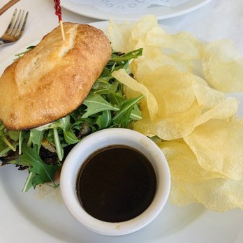 Laney Bistro - French Dip Sandwich with au jus and fresh potato chips - Desserts Near Me - Oakland, California