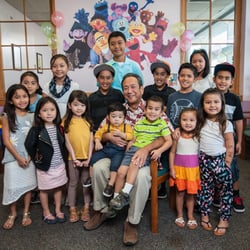 Honolulu Keiki Dental - Dr. Dean Sueda with his second generation patients. (Each child has one parent who was also a former patient.)