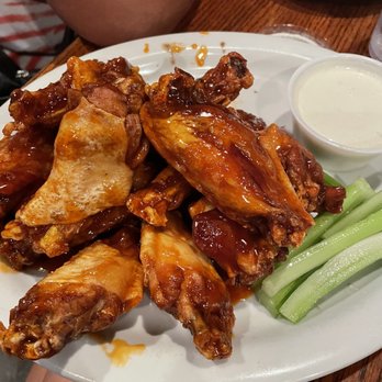 The Griffon - Buffalo wings with celery and blue cheese - Pubs Near Me - Charleston, South Carolina The Griffon - Buffalo wings with celery and blue cheese - Pubs Near Me - Charleston, South Carolina