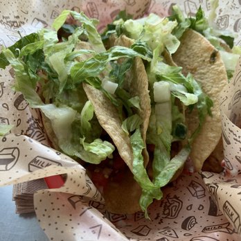 Chipotle Mexican Grill - Chicken tacos (hard shell), lettuce, pico de Gallo, guacamole and lettuce. - Mexican Near Me - Toronto, Ontario