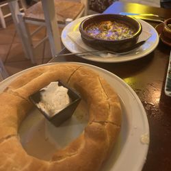 Sevillano - Ring bread and heavenly butter and shrimp pil pil garlic sizzling sauce