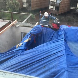 Our poorly tarped roof that collapsed from heavy rain