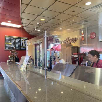 Burattino Brick Oven Pizza - Lady in white took our order. Not so friendly :( - Pizza Near Me - Carson, California