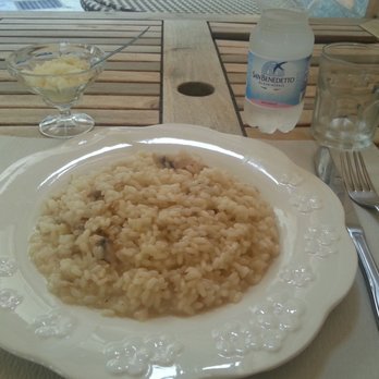 Caffe' del Centro - Mushroom risotto served with grated cheese. - Pizza Near Me - Leini, TO