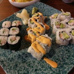 Yellowtail and scallion, spicy salmon, and California rolls.