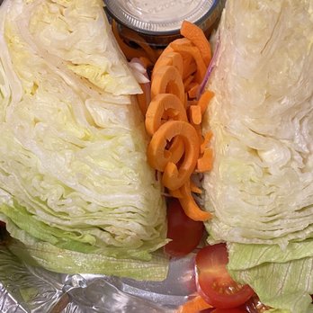 Buffalo Chophouse - Iceberg wedge (it came with extra blue cheese dressing) - Steakhouses Near Me - Buffalo, New York Buffalo Chophouse - Iceberg wedge (it came with extra blue cheese dressing) - Steakhouses Near Me - Buffalo, New York