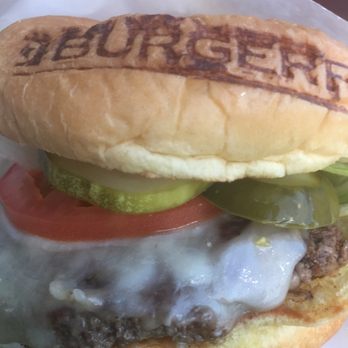 BurgerFi - Single burger with white cheddar, lettuce, tomato, raw onion, pickles - Hot Dogs Near Me - Jacksonville, Florida