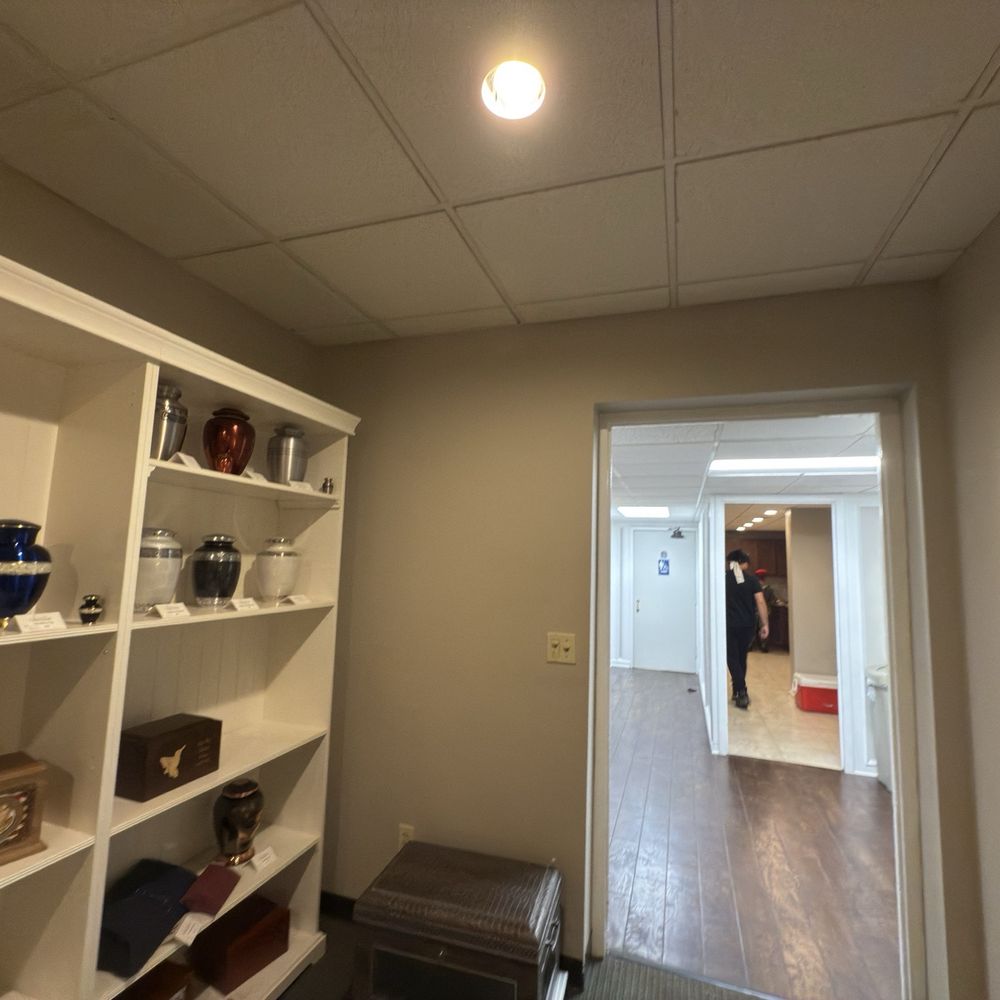 St. Louis Cremation - Back room looking out into lobby and kitchen with a view in the back to the women's bathroom accessibility - Cremation Services Near Me - St. Louis, Missouri St. Louis Cremation - Back room looking out into lobby and kitchen with a view in the back to the women's bathroom accessibility - Cremation Services Near Me - St. Louis, Missouri