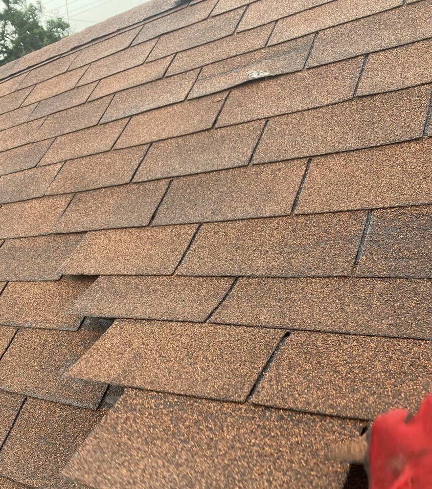 Slide of Metro Roofing