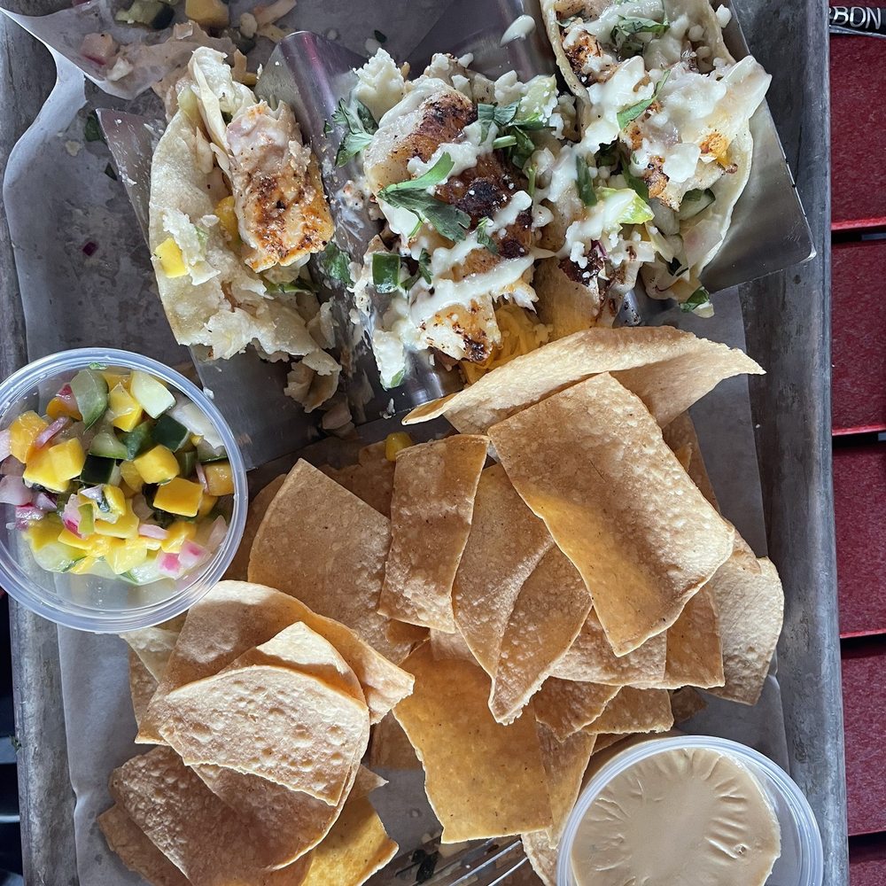 Tiki Docks Riverview - Blackened, grouper tacos with nachos. You get three tacos. It was delicious. Two of us ordered it and we were both satisfied. - Salad Near Me - Riverview, Florida Tiki Docks Riverview - Blackened, grouper tacos with nachos. You get three tacos. It was delicious. Two of us ordered it and we were both satisfied. - Salad Near Me - Riverview, Florida