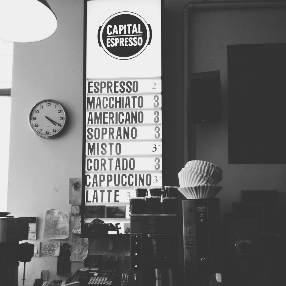 Capital Espresso - a black and white photo of a coffee shop - Coffee & Tea Near Me - Toronto, Ontario
