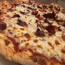 Basil Boys - Bacon and onion pizza. It does not disappoint!