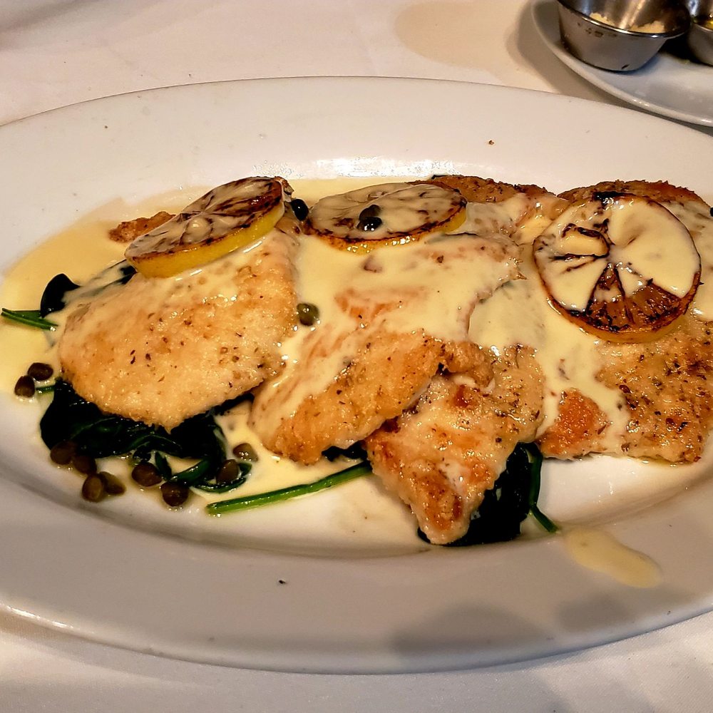 Di Pescara - Chicken Limone on a bed of spinach, as part of the 'supper club' pre-fixe. Delicious. - Italian Near Me - Northbrook, Illinois