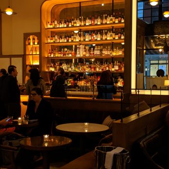 San Morello - Eye-catching and busy bar at the San Morello. - Italian Near Me - Detroit, Michigan San Morello - Eye-catching and busy bar at the San Morello. - Italian Near Me - Detroit, Michigan