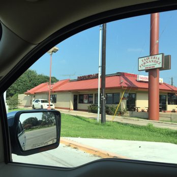 Taqueria Fernandez - a view of a taqueria restaurant from a car window - Mexican Near Me - El Campo, Texas