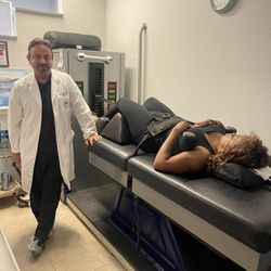 Orlando Spinal Aid Center - Me and dr on the decompression Table