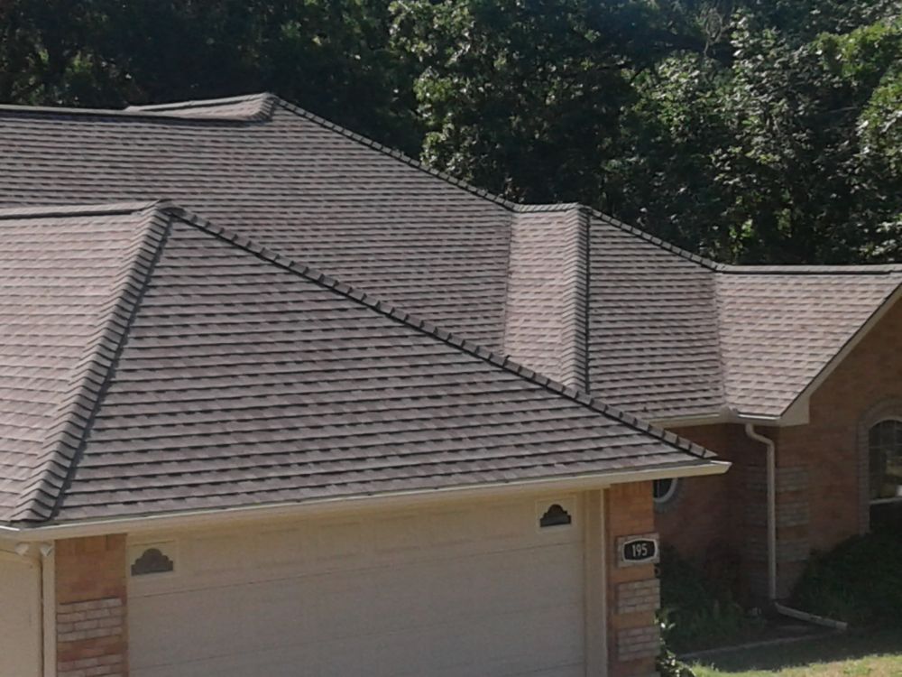 Slide of Reid's Roofing