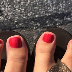 Sky Nail Care - Polish on the skin surround my toes that they were in too much of a rush to clean off. I'd do a better job myself.