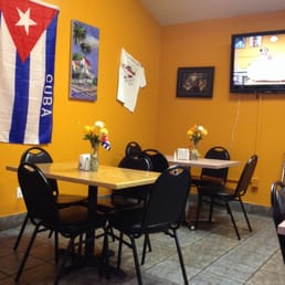 Dining room is small and nothing fancy. But very clean. Dining room is small and nothing fancy. But very clean.