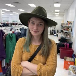 Goodwill Industries of Eastern NC - Chapel Hill - This shirt was purchased at this location (trying on hat)