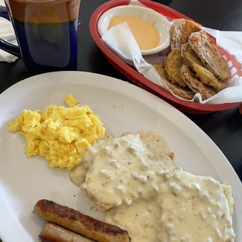 Rick's Diner - Biscuits and gravy with sausage and scrambled eggs Back: Fried green tomatoes - Diners Near Me - Port St Lucie, Florida Rick's Diner - Biscuits and gravy with sausage and scrambled eggs Back: Fried green tomatoes - Diners Near Me - Port St Lucie, Florida