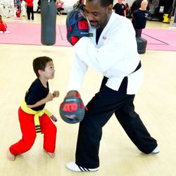 Master Hill's Red Dragon Martial Arts - Red Dragon student working with Mr. Smith
