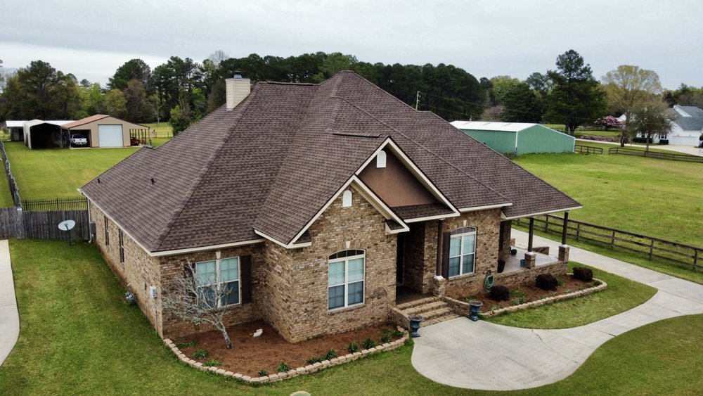 Slide of RainTight Roofing & Construction