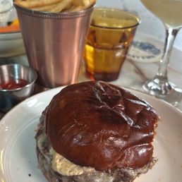 The burger on the happy hour menu. $10 plus the fries they were very good and for a great price. The burger on the happy hour menu. $10 plus the fries they were very good and for a great price.