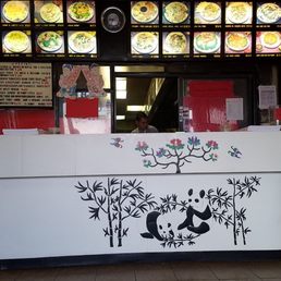 a restaurant counter with a panda on it a restaurant counter with a panda on it