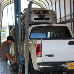 Alaska Auto Transport - Specialized racking system for enclosed transport between WA and AK.