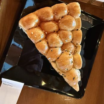 Haraz Coffee House - Bee bites or just right I'm not sweet with drizzle of honey with the warm latte - Desserts Near Me - College Station, Texas Haraz Coffee House - Bee bites or just right I'm not sweet with drizzle of honey with the warm latte - Desserts Near Me - College Station, Texas