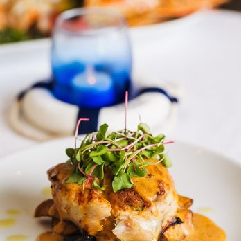 Remissis Restaurant - a plate of food on a table - Seafood Near Me - Miami, Florida Remissis Restaurant - a plate of food on a table - Seafood Near Me - Miami, Florida