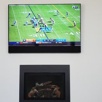 Audio Video Integration - Sony 65" Bravia Master Series over Mendota 44i Gas Insert - Home Theatre Installation Near Me - San Rafael, California