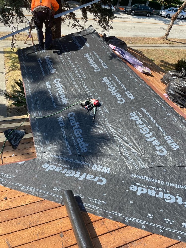 Slide of Golden Touch Roofing