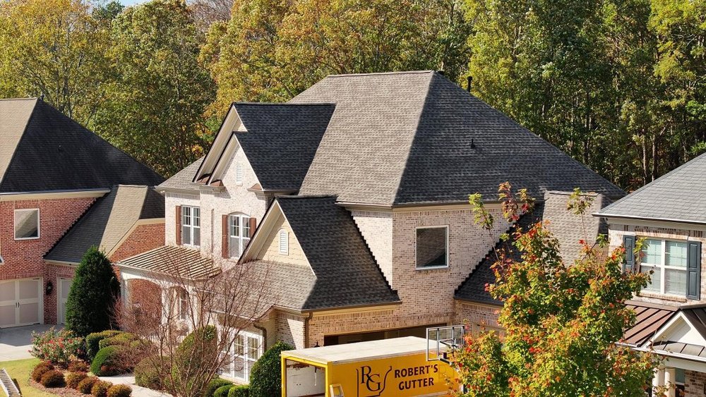 Slide of Robin Hood Roofing