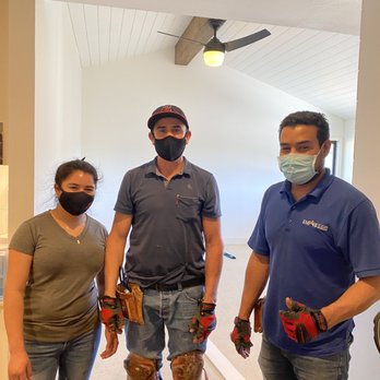 Off Price Carpet & Flooring - two men and a woman wearing protective gear - Carpeting Near Me - San Jose, California