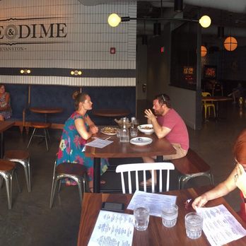 Five & Dime - Panorama view of the interior. The tables and chairs are beautiful. LOL @ the woman in front that hid her face while I was taking the photo. - American Near Me - Evanston, Illinois