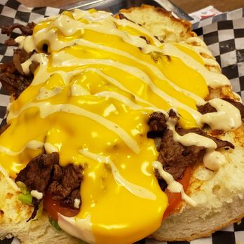 Top Gun Steak & Burger - Ribeye Steak with Grilled Onions and Cheese (B52) - Burgers Near Me - Vaughan, Ontario Top Gun Steak & Burger - Ribeye Steak with Grilled Onions and Cheese (B52) - Burgers Near Me - Vaughan, Ontario