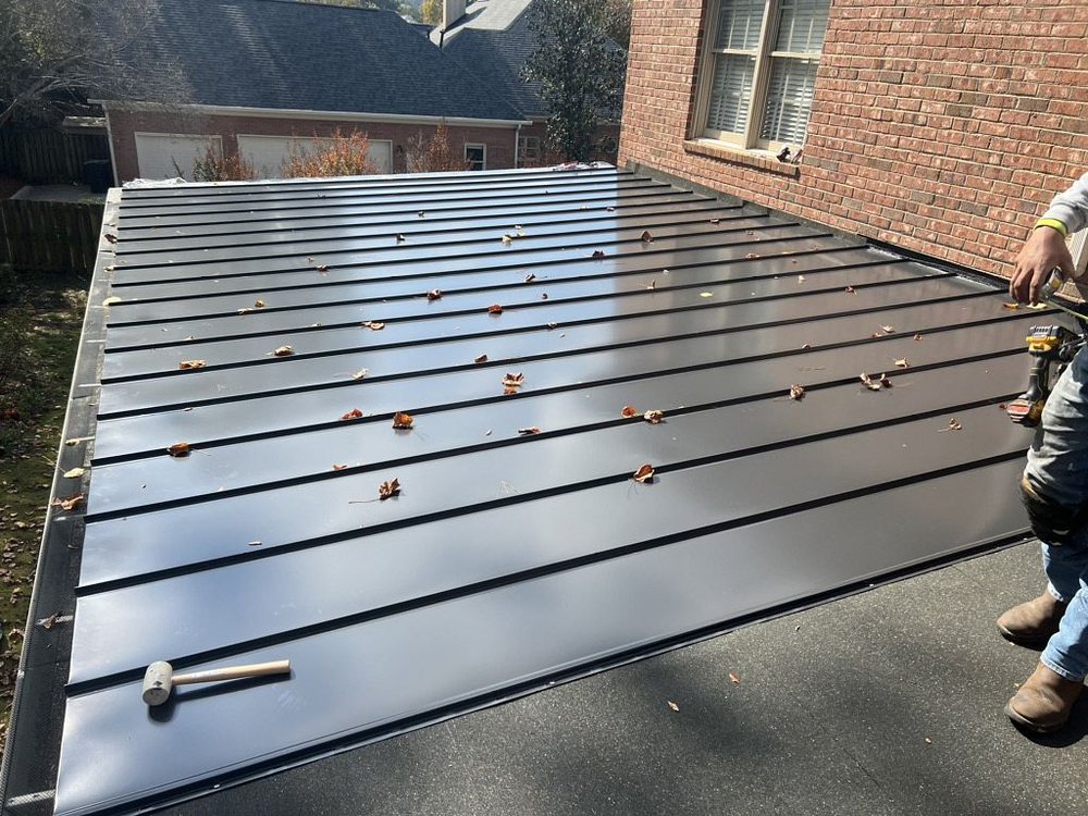 Slide of Denali Roofing and Restorations