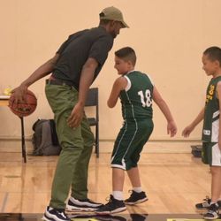 Accelerate Hoops - Coach having fun with the player's during halftime