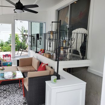 Black Sea Construction - a living room with a ceiling fan - General Contractors Near Me - Central Islip, New York