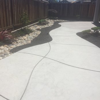 Richard's Original Landscaping - Stamped concrete and tile floor - Landscaping Near Me
