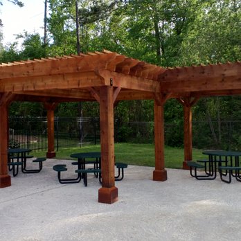 Kyle Roth Construction - a pergolated pavilion with picnic tables - General Contractors Near Me Kyle Roth Construction - a pergolated pavilion with picnic tables - General Contractors Near Me