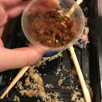 Sushi Nami Royale - a person holding a bowl of food with chopsticks - Japanese Near Me - Halifax, Nova Scotia Sushi Nami Royale - a person holding a bowl of food with chopsticks - Japanese Near Me - Halifax, Nova Scotia