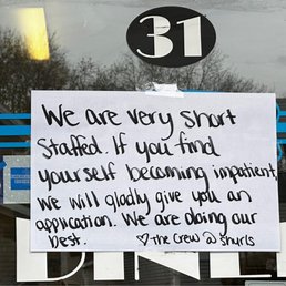 a sign in the window a sign in the window